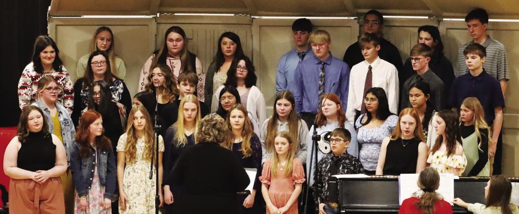 Under the direction of Kym Lebeda, Lyman’s middle school and high school choir serenaded the crowd with “Rocky Top” during the spring concert on Wednesday, March 27th at the Lyman Gardens. The middle school also sang “Erie Canal”, “Inscription of Hope”, and “Carry the Light”. The high school choir sang “The River Sleep Beneath the Sky”, “Ubi Caritas et Amor”, “Sweet Caroline” and “Livin’ on a Prayer”.