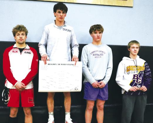 Senior Rory McManus - 165# (left) brought home third place hardware from SDHSAA Region 4B Tournament on Saturday against Jordan Risse (Bennett County, right) by fall. McManus will wrestle at State B Wrestling Tournament on Thursday, February 22-24 in Sioux Falls. Other place winners at 165# were Thane Simons (Philip/Kadoka Area/Wall, center) coming in first place and Colton Brady (Stanley County, right center) finishing with second place.