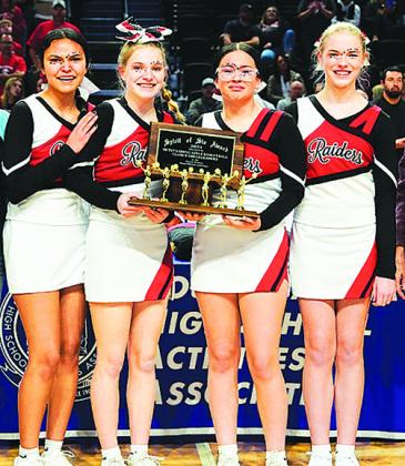 Lyman Raiders Cheerleaders l-r: Belle Jones, Aerika Janssen, Tallie Long Turkey, and Carly Hoffman, win the Spirit of Six Award at the State B Basketball Tournament at the Monument in Rapid City. Not pictured Cheer Coach Becky Diehm.