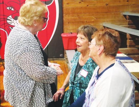 L-r: Jan Widvey, Marlene Patrick, and Bonnie Judd (Cox) visit during the Vivian All School Reunion Saturday, June 11.