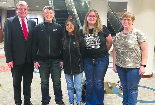 Left-right: National JAG President Ken Smith, Brody Steinger (Sioux Falls-Roosevelt), Melina Shields (Lyman), April Hollingsworth (Wagner) and Chaperone Nicole Fette grab a quick picture before heading into one of their lunch sessions. Photo submitted by Melina Shields, LHS