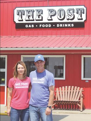 New owners of The Post, Steve Gabriel and Sarah Stanley, stand in front of the building, which showcases their new sign with the new name. New hours for the C-Store are: Monday - Friday from 6 am to 9 pm; and Saturday and Sunday from 7 am to 9 pm. Bar hours are: 4 pm to 2 am 7 days a week.